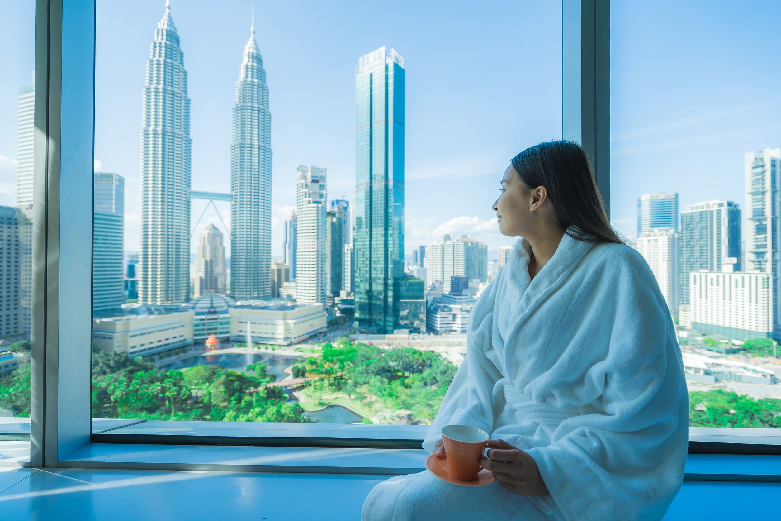 Kuala Lumpur And Enjoy Coffee Cup And Looking The City In Malaysia